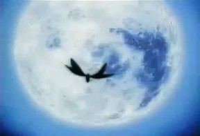 Una mariposa volando hacia un planeta